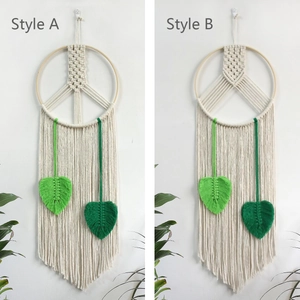 Bohemian peace sign and chevron woven cotton wall hanging with leaf accents and tassels