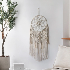 Bohemian dreamcatcher wall hanging with handmade cotton rope and geometric star pattern