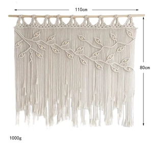 Bohemian hand-woven wall tapestry with leaf pattern and tassels in cream cotton