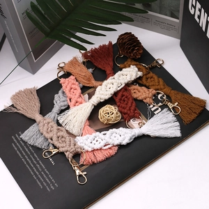 Handmade bohemian cotton tassel keychains with braided patterns and metal clasps