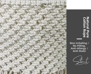 Macro shot of hand-woven cotton bohemian lampshade texture with diamond weave pattern