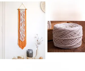 Detailed macro view of bohemian hand-woven orange and white leaf fringe wall hanging cotton rope
