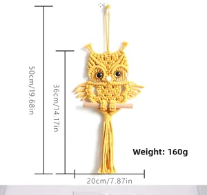 Macro detail of yellow hand-woven owl wall hanging with dimensions 20x36cm and weight 160g