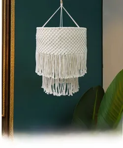 Detailed view of handmade bohemian lamp shade with intricate cream cotton rope weaving