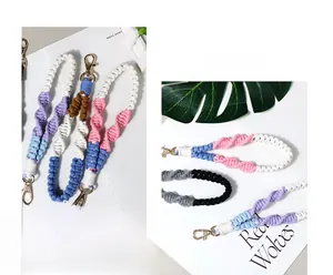 Detail of handmade braided cotton phone straps with durable metal lobster clasps