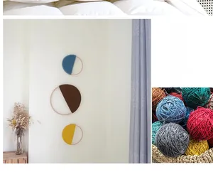 Detail of three handmade bohemian round woven tapestries in blue, brown, and yellow tones
