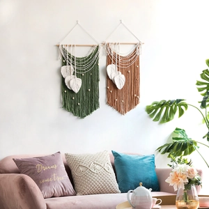 Handmade Bohemian leaf wall hanging set with woven cotton ropes and decorative wood beads