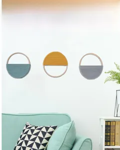 Three-piece bohemian wall decor set featuring woven semicircles in blue yellow and gray