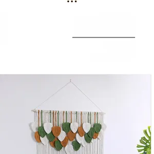 Detail of Nordic boho wall decor with handmade colorful woven cotton leaf tassels