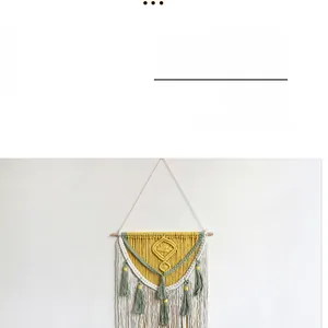 Detail of Nordic handmade woven tapestry featuring geometric cotton ropes and long tassels