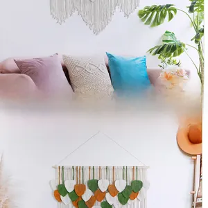 Detailed view of handmade bohemian woven leaf macrame wall hanging for home decor