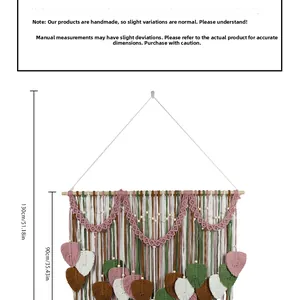 Close-up of handmade Bohemian woven tapestry featuring leaf-shaped cotton fringe detail