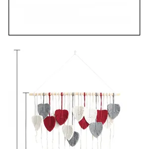 Detailed size view of macrame wall hanging showing 105cm height and handmade leaf tassels