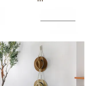 Detailed hand-woven cotton rope texture of a bohemian wall-mounted hat storage rack