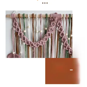 Detail of macrame wall hanging featuring hand-woven geometric patterns and wood beads