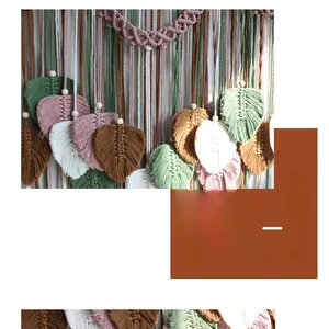 Detailed macro view of handmade woven leaf tapestry with cotton tassels and wooden beads
