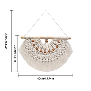Handmade boho macrame wall hanging in beige cotton rope with dimensions 40x55cm