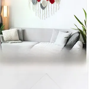 Detail of bohemian hand-woven leaf macrame wall hanging in a minimalist Nordic style room