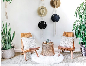 Detailed wall hanging macrame hat organizer showing handwoven cotton rope texture