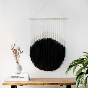 Bohemian handmade cotton rope wall hanging with black circular tassel design