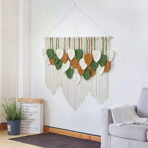 Handmade Bohemian leaf wall hanging in cotton macrame with wooden rod for home decoration