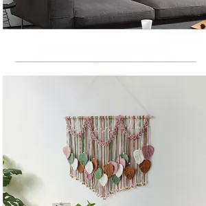 Detailed close-up of handmade macrame leaf tapestry with colorful cotton ropes and wood beads