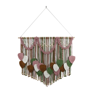 Handmade Macrame wall hanging with colorful woven leaves on a natural wood branch