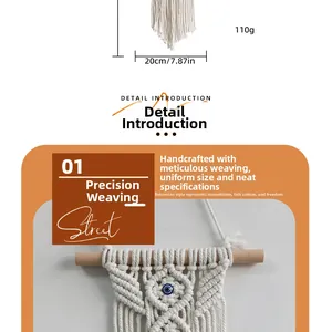 Detail view of handmade woven cotton tapestry with evil eye bead and dimensions info