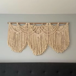 Detailed close-up of Bohemian handmade cotton rope macrame with intricate woven fringe