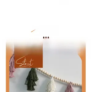 Detail view of handmade wooden beads with colorful tassels for boho wall hanging decor