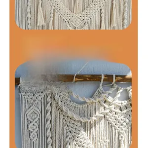 Macro detail of Bohemian wall hanging showing intricate hand-woven cotton knots and tassels