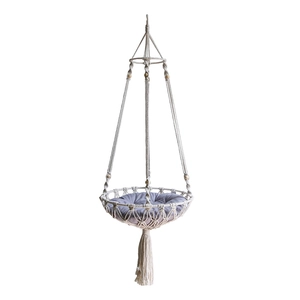 Handmade macrame cat hammock with white cotton rope and purple cushion in boho style