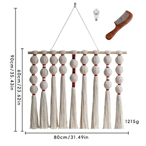 Handmade macrame wall hanging with off-white tassels and wooden bar for home decor
