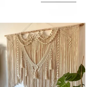 Macro detail of hand-woven macrame wall hanging with intricate cotton rope patterns