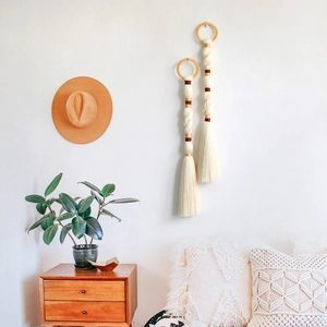 Nordic handmade woven tassel wall hanging with wood rings in bohemian home decor style
