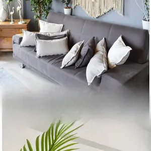 Detailed texture of hand-woven cotton pillows in grey and white on a modern sofa