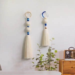 Nordic handmade woven wall hanging decor with bohemian cotton tassels and blue details