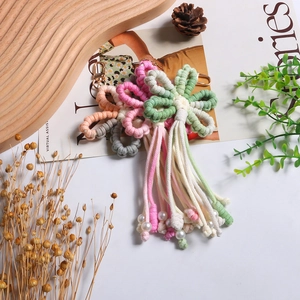 Handmade woven flower keychain with colorful tassel and pearl charm in four colors