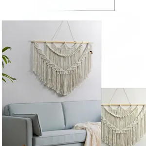 Detailed close-up of Bohemian handmade macramé wall hanging with geometric woven patterns