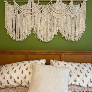 Handmade boho macrame wall hanging tapestry with cotton tassels and wooden rod for decor