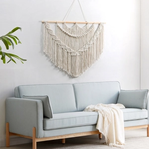 Handwoven Bohemian macrame wall hanging tapestry with geometric patterns and fringe