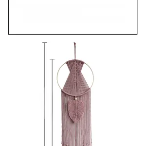Detail view of pink macrame wall hanging showing 90cm to 100cm length measurements