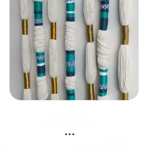 Detailed close-up of Nordic woven cotton tapestry with blue and gold thread accents