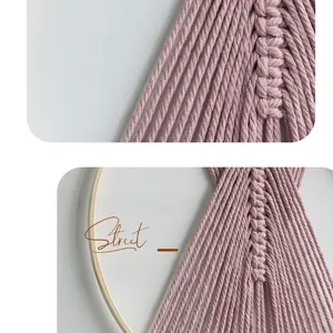 Detail of lavender handmade woven cotton cord on circular wooden frame wall hanging
