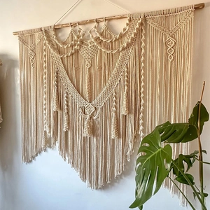 Handmade Bohemian woven tapestry with cotton tassels on wood rod for wall decor