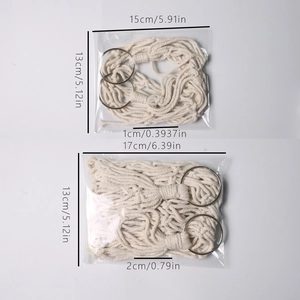 Handwoven beige macrame wall decor tassels with rings shown in product packaging