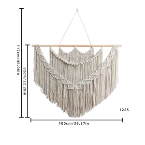 Bohemian macrame wall hanging with handmade cotton weave and decorative tassels