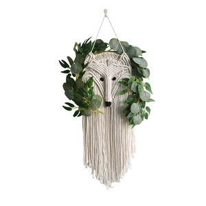 Handmade macrame fox wall hanging with cotton rope tassels and eucalyptus greenery