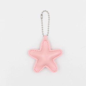 Pink star-shaped PU leather keychain featuring fine stitching and a silver metal bead chain