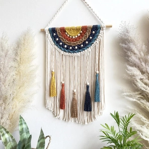 Handwoven macrame rainbow wall hanging with cotton tassels and wooden rod for home decor